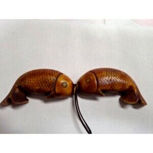 ANTIQUE CARVED BONE EROTICA FISH PENDANT‎